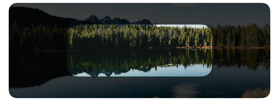 With a compositing group the undimmed photograph remains visible through the centered rounded rectangular opening