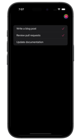 A to-do list showing three tasks, two of which are marked as completed with pink checkmarks
