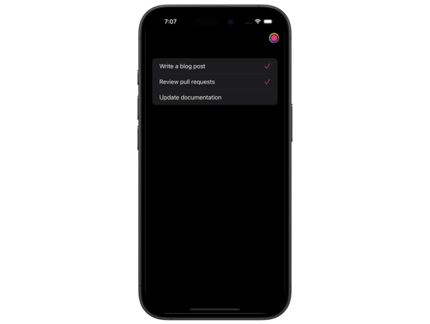A to-do list showing three tasks, two of which are marked as completed with pink checkmarks